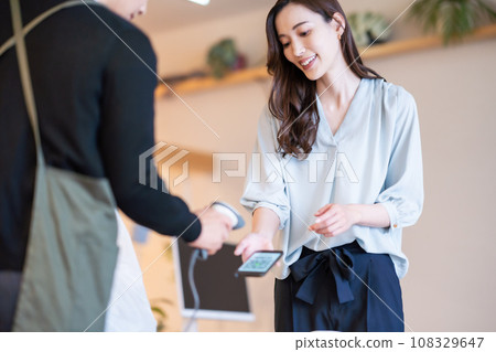 Image of a store that is cashless with barcode scanners 108329647