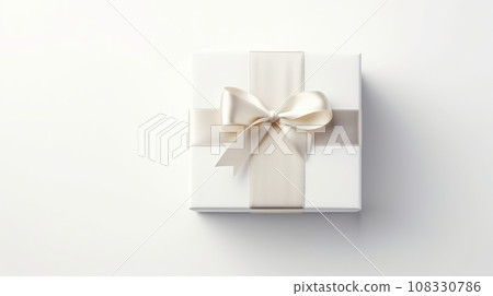 White gift box with cream ribbon on white background. Square box with neat bow and tails. Light gray gradient backdrop. Perfect for themes of celebration, surprise and generosity. White gift box with cream ribbon on white background. Square box with neat bow and tails. Light gray gradient backdrop. Perfect for themes of celebration, surprise and generosity. 108330786