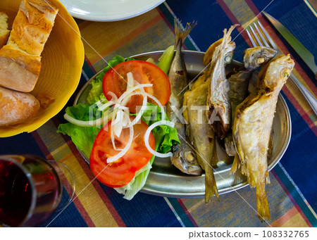 Fried fish scad with vegetables. Galician cuisine Fried fish scad with vegetables. Galician cuisine 108332765