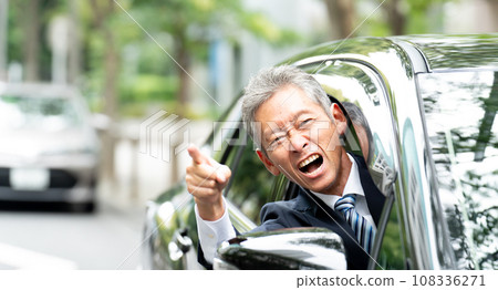 Elderly people who get angry while driving a car 108336271