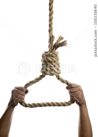 Man hand holding rope with a hangman noose knot Man hand holding rope with a hangman noose knot 108338640