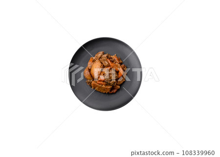 Delicious vegetable stew of potatoes, beef meat, mushrooms, carrots, salt, spices and herbs 108339960