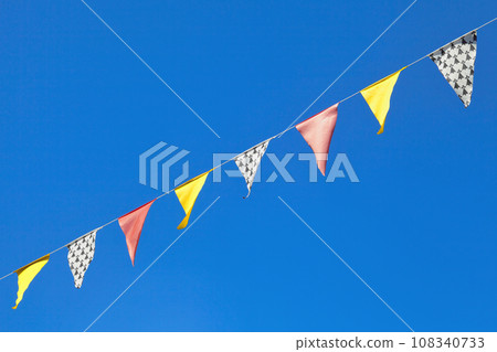 Yellow, red and ermine bunting flags 108340733