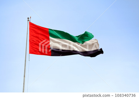 UAE flag waving atop of its pole 108340736