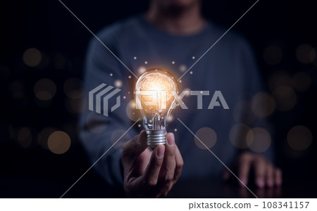 New idea innovation concept, Man holding Light bulbs with Brain inside and digital connection line. Creative and innovation inspiration. Idea and imagination, Business Bright idea, Science innovation, New idea innovation concept, Man holding Light bulbs with Brain inside and digital connection line. Creative and innovation inspiration. Idea and imagination, Business Bright idea, Science innovation, 108341157