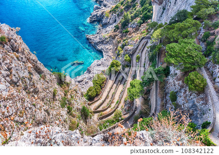View over Via Krupp, winding cliffside road in Capri island, Italy 108342122