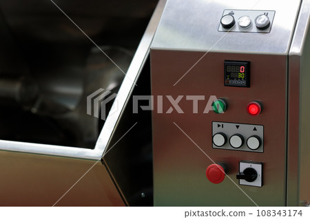 industrial automatic meat mixer machine close up 108343174