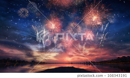 fireworks over night city sky, holiday background, bright colorful lights 108343191