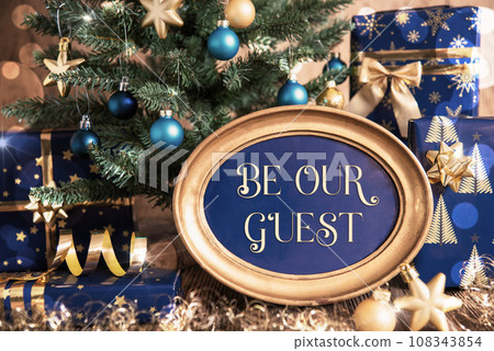 Oval Frame With Text be Our Guest, Christmas Tree Background 108343854