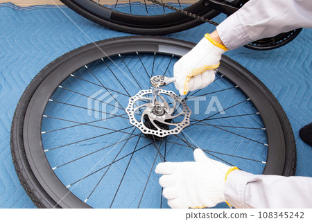 Bicycle (road bike) disc brake assembly work 108345242