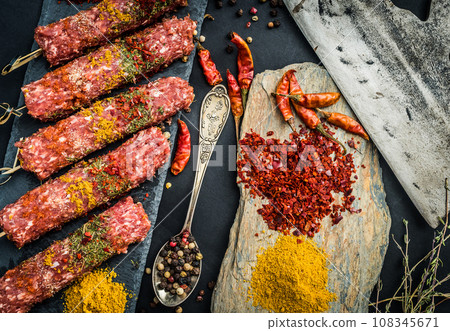 Raw kebab with spices Raw kebab with spices 108345671