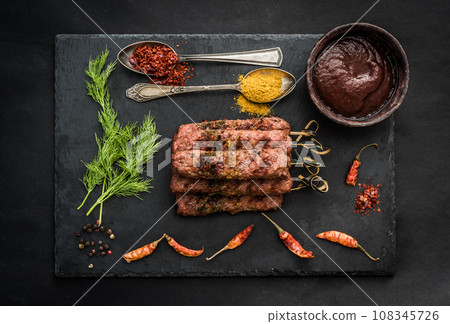 Grilled kebab with spices 108345726