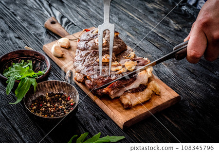 Grilled meat on a table 108345796