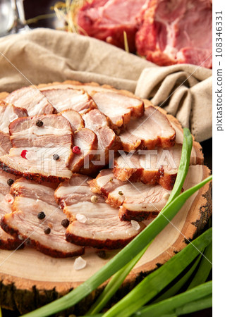 Roasted pork belly sliced on wooden plate 108346331