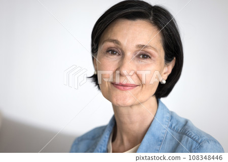 Close up head shot portrait good-looking mature woman 108348446