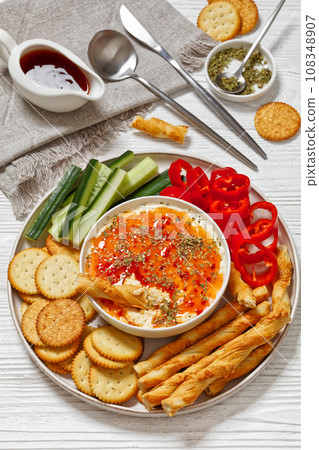 Hot Pepper Jelly Cheese Dip with crackers, veggies Hot Pepper Jelly Cheese Dip with crackers, veggies 108348907