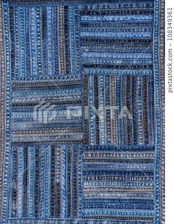 Denim fabric pattern in patchwork style. 108349361