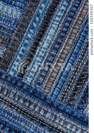 Diagonal denim fabric pattern in patchwork style. Diagonal denim fabric pattern in patchwork style. 108349367