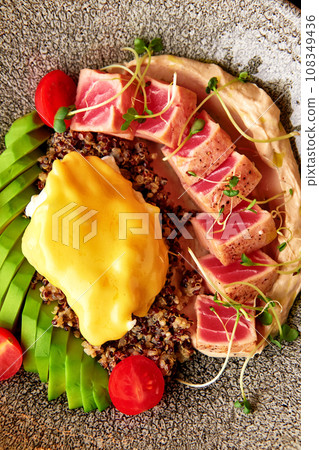 Quinoa with tuna, hummus, egg and vegetables Quinoa with tuna, hummus, egg and vegetables 108349436