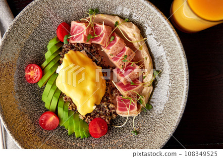 Quinoa with tuna, hummus, egg and vegetables 108349525