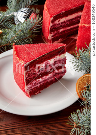 Slice of Red velvet cake decorated for Christmas. 108349540
