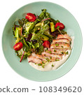 Fried calamari rings with healthy salad and cream sauce 108349620