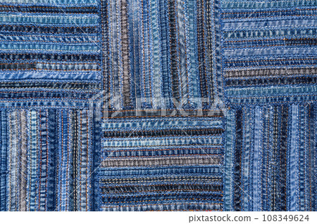 Denim fabric pattern in patchwork style. 108349624