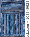 Denim fabric pattern in patchwork style. 108349625