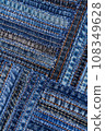 Diagonal denim fabric pattern in patchwork style. 108349628