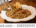 Hot pasta with toast on top 108350545