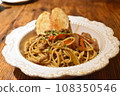 Hot pasta with toast on top 108350546