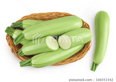 zucchini or marrow in a wicker basket isolated on white background with full depth of field. Top view. Flat lay 108351542