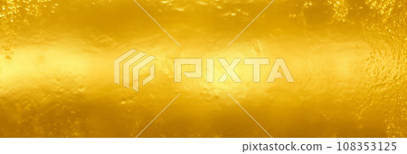 Golden background. Gold texture. Shiny golden wall texture. Beatiful luxury and elegant gold wallpaper Golden background. Gold texture. Shiny golden wall texture. Beatiful luxury and elegant gold wallpaper 108353125