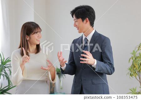 Business woman 1 starts talking by saying, “I have an idea that I would like to talk about.” Business woman 1 starts talking by saying, “I have an idea that I would like to talk about.” 108353475