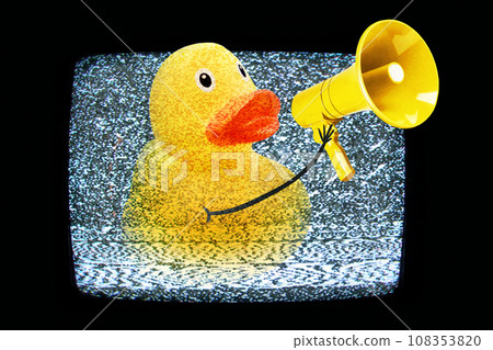 Creative yellow duck screams in a yellow loudspeaker from TV with white noise, concept. Media and video advertising, creative idea. Successful propaganda. Mass media Creative yellow duck screams in a yellow loudspeaker from TV with white noise, concept. Media and video advertising, creative idea. Successful propaganda. Mass media 108353820