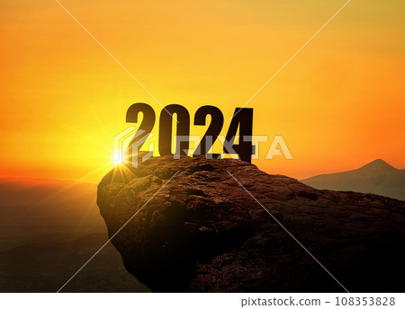 New Year 2024 at sunset. Silhouette 2024 stands on a mountain with sun rays at sunrise, creative idea. Year 2024, concept New Year 2024 at sunset. Silhouette 2024 stands on a mountain with sun rays at sunrise, creative idea. Year 2024, concept 108353828