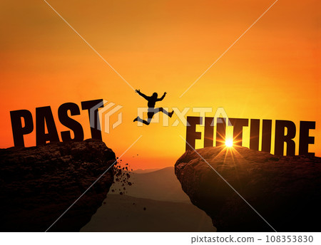 Successful man jumps over a cliff with the text Future at sunset, concept. Leap from past to future, creative idea. Rock at sunrise 108353830