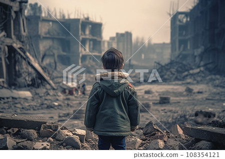 Concept of war, a toddler child from behind with destroyed city on background, dark smoke and burning buildings, nuclear accident or terrorism. Concept of war, a toddler child from behind with destroyed city on background, dark smoke and burning buildings, nuclear accident or terrorism. 108354121