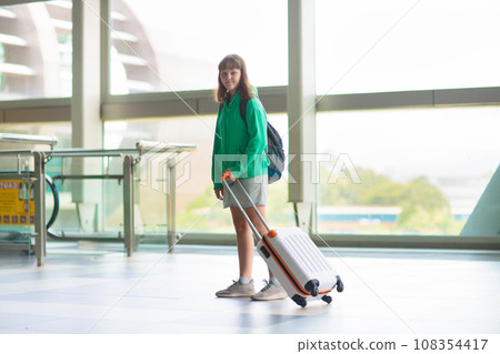 Family in airport. Kids fly. Travel with child. 108354417