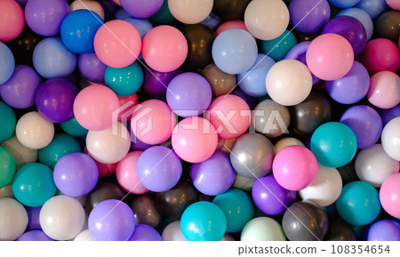 Close-up of a background of colorful balls for a dry pool Close-up of a background of colorful balls for a dry pool 108354654