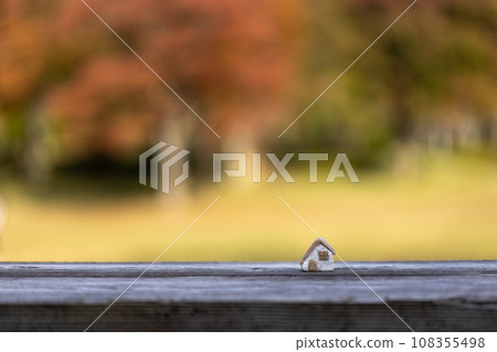 Small cute house with autumn color background 108355498