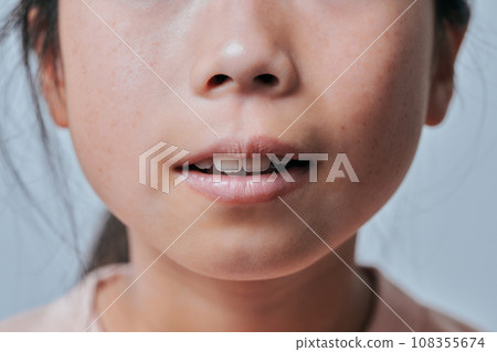 4th grade girl's teeth 108355674