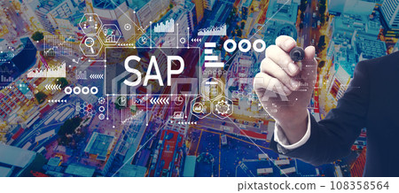 SAP theme with businessman in city at night SAP theme with businessman in city at night 108358564