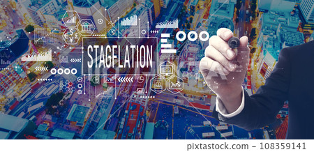 Stagflation theme with businessman in city at night 108359141