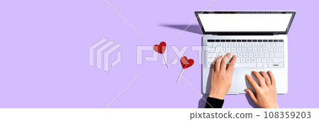 Laptop computer with heart cushions 108359203