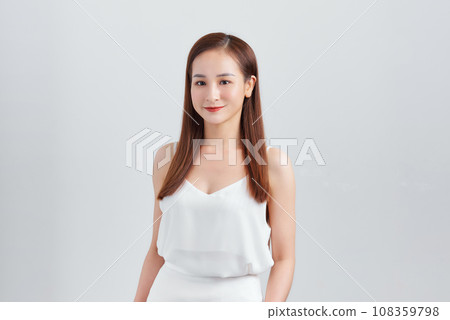 Young Asian woman posing on white background Young Asian woman posing on white background 108359798