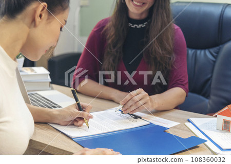 close up Team Businesswoman partners sign contract with success business joint venture deal. Diversity Businesswoman teams handshake together. Partnership teamwork meeting signing contract business close up Team Businesswoman partners sign contract with success business joint venture deal. Diversity Businesswoman teams handshake together. Partnership teamwork meeting signing contract business 108360032