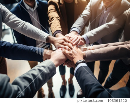 Diverse business people group put hands together in stack pile at training as concept of sales team corporate unity connection, teambuilding loyalty, support in teamwork, coaching, close up top view. 108361220
