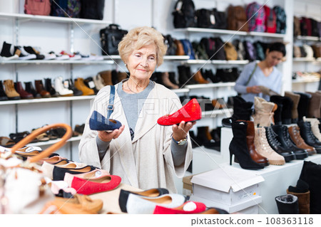 Mature woman chooses ballet flats Mature woman chooses ballet flats 108363118