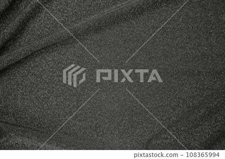 Background of draped dark gray fabric with silver lurex thread Background of draped dark gray fabric with silver lurex thread 108365994